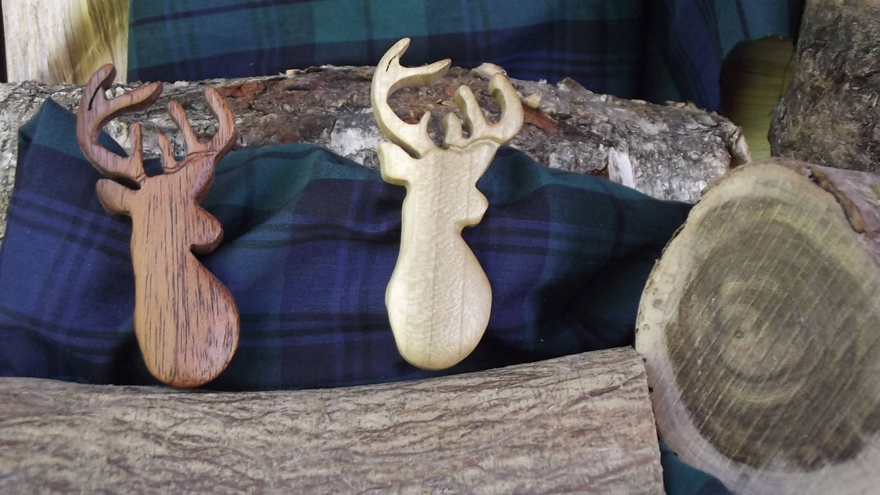 Hand carved Stag brooches