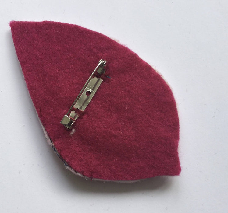 Felt and silk velvet brooch by Rosalind Johansson